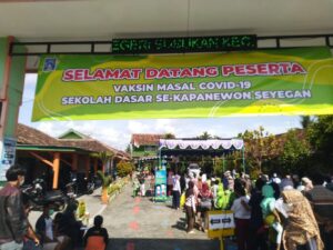 PEMBERIAN VAKSINASI COVID-19 DOSIS I UNTUK ANAK USIA 6 SAMPAI 11 TAHUN KALURAHAN MARGOKATON